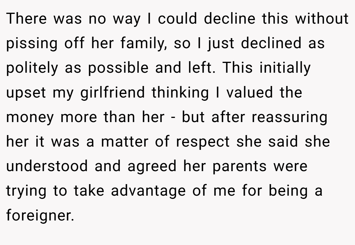 There was no way I could decline this without pissing off her family, so I just declined as politely as possible and left. This initially upset my girlfriend thinking I valued the money more than her - but after reassuring her it was a matter of respect she said she understood and agreed her parents were trying to take advantage of me for being a foreigner.