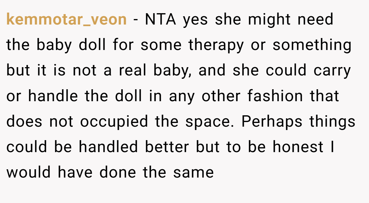 kemmotar_veon - NTA yes she might need the baby doll for some therapy or something but it is not a real baby, and she could carry or handle the doll in any other fashion that does not occupied the space. Perhaps things could be handled better but to be honest I would have done the same