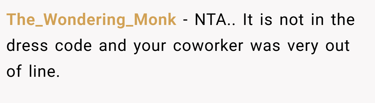 The_Wondering_Monk − NTA.. It is not in the dress code and your coworker was very out of line.