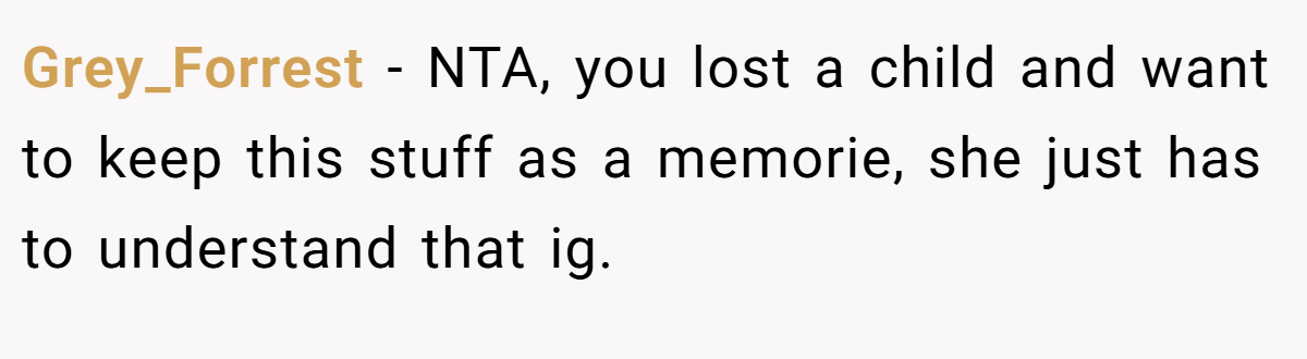 Grey_Forrest − NTA, you lost a child and want to keep this stuff as a memorie, she just has to understand that ig.