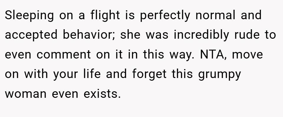Sleeping on a flight is perfectly normal and accepted behavior; she was incredibly rude to even comment on it in this way. NTA, move on with your life and forget this grumpy woman even exists.