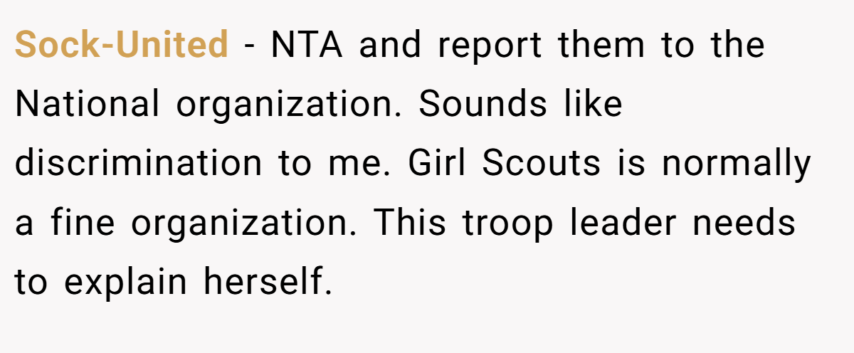 Sock-United - NTA and report them to the National organization. Sounds like discrimination to me. Girl Scouts is normally a fine organization. This troop leader needs to explain herself.