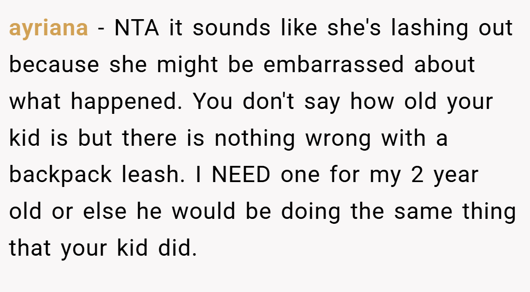ayriana − NTA it sounds like she's lashing out because she might be embarrassed about what happened. You don't say how old your kid is but there is nothing wrong with a backpack leash. I NEED one for my 2 year old or else he would be doing the same thing that your kid did.