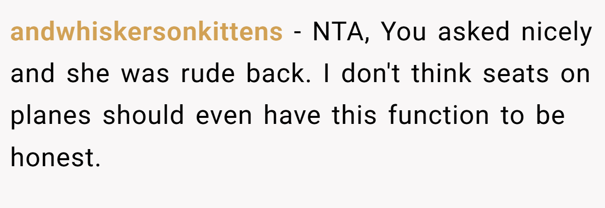 andwhiskersonkittens − NTA, You asked nicely and she was rude back. I don't think seats on planes should even have this function to be honest.