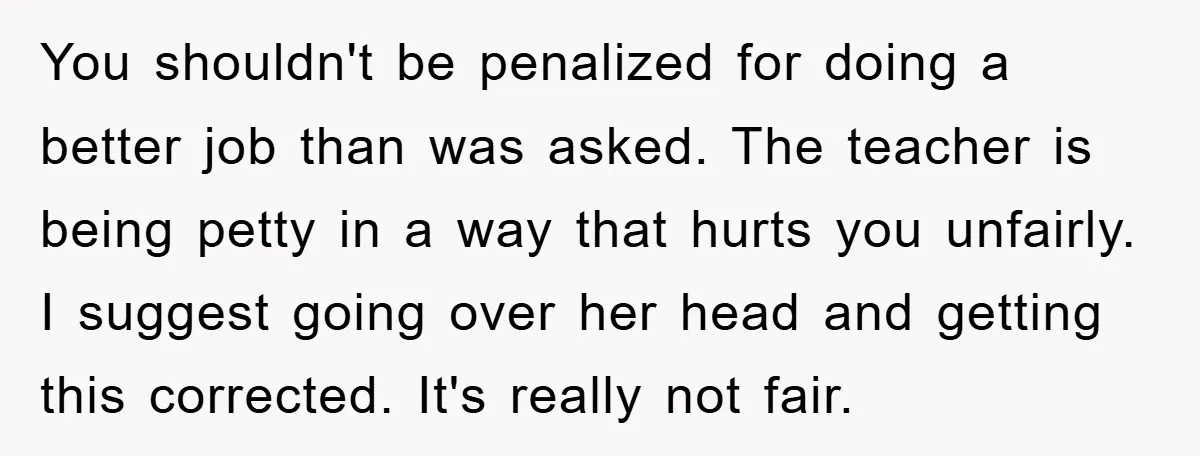 You shouldn't be penalized for doing a better job than was asked. The teacher is being petty in a way that hurts you unfairly. I suggest going over her head...
