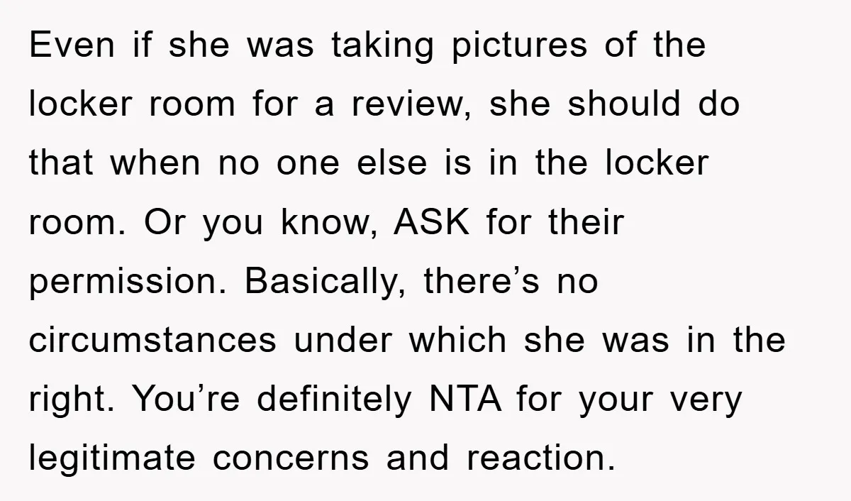 Even if she was taking pictures of the locker room for a review, she should do that when no one else is in the locker room. Or you know, ASK...