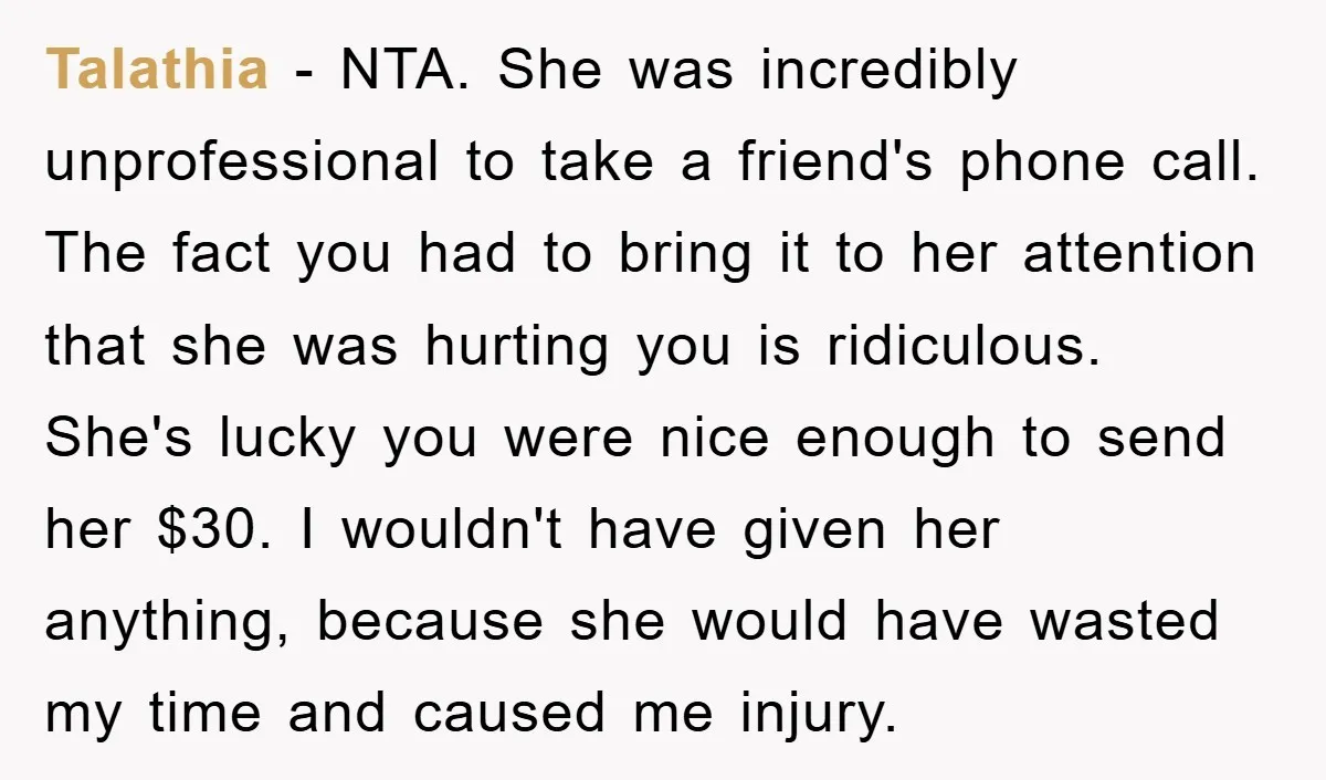 Talathia − NTA. She was incredibly unprofessional to take a friend's phone call. The fact you had to bring it to her attention that she was hurting you is ridiculous....