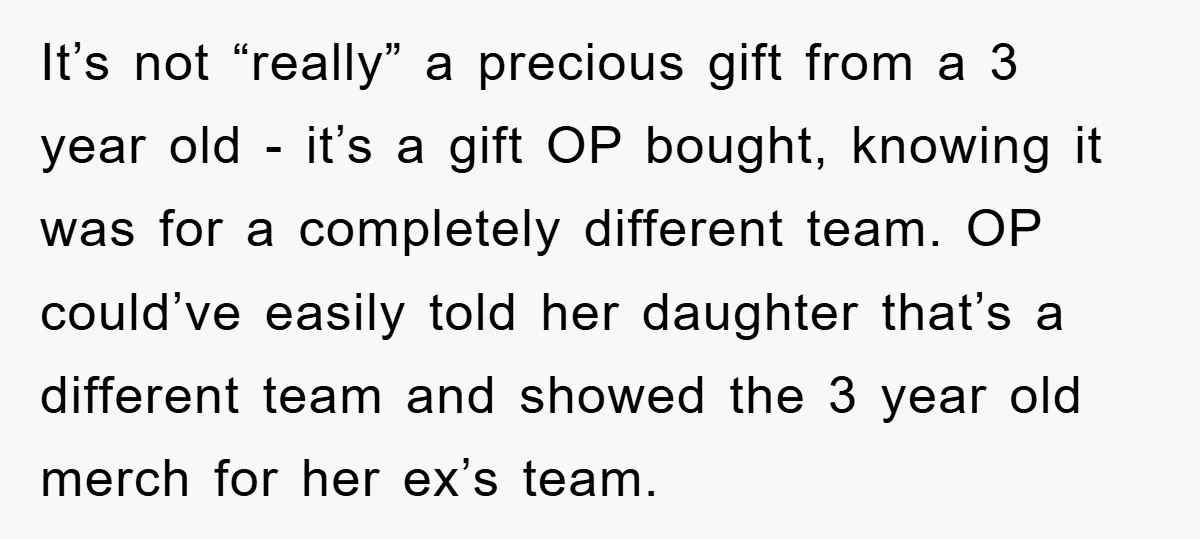 It’s not “really” a precious gift from a 3 year old - it’s a gift OP bought, knowing it was for a completely different team. OP could’ve easily told her...
