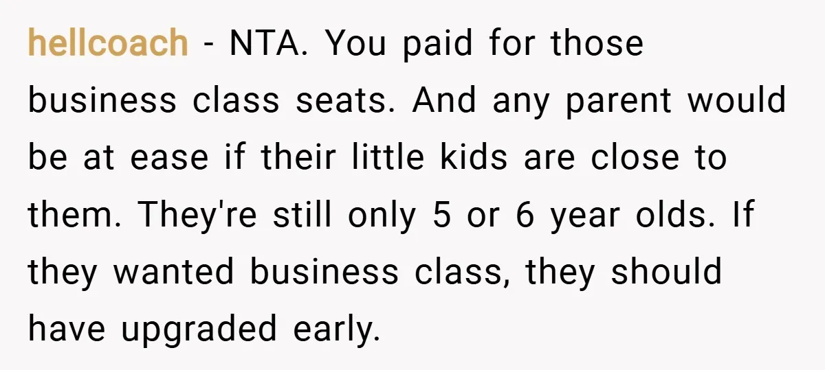 hellcoach − NTA. You paid for those business class seats. And any parent would be at ease if their little kids are close to them. They're still only 5 or...
