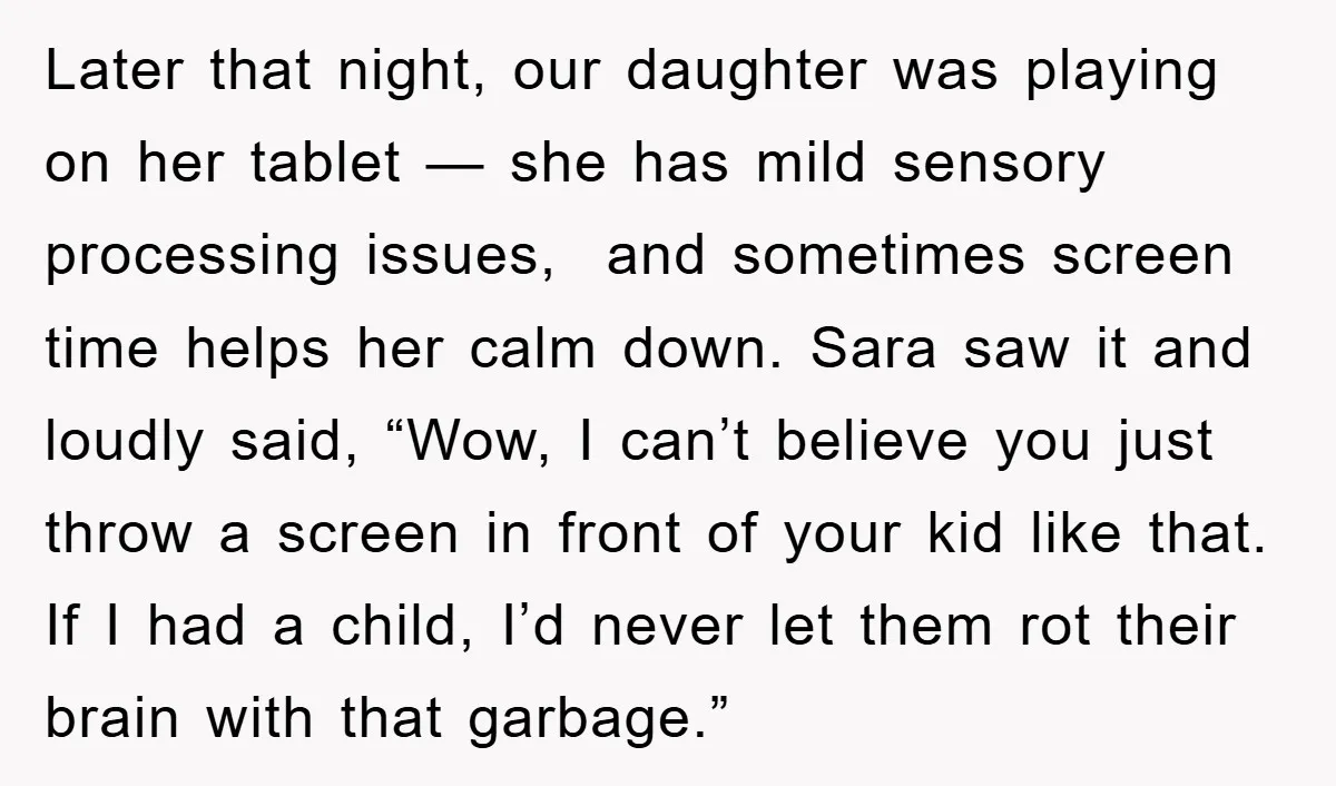 Later that night, our daughter was playing on her tablet — she has mild sensory processing issues, and sometimes screen time helps her calm down. Sara saw it and loudly...