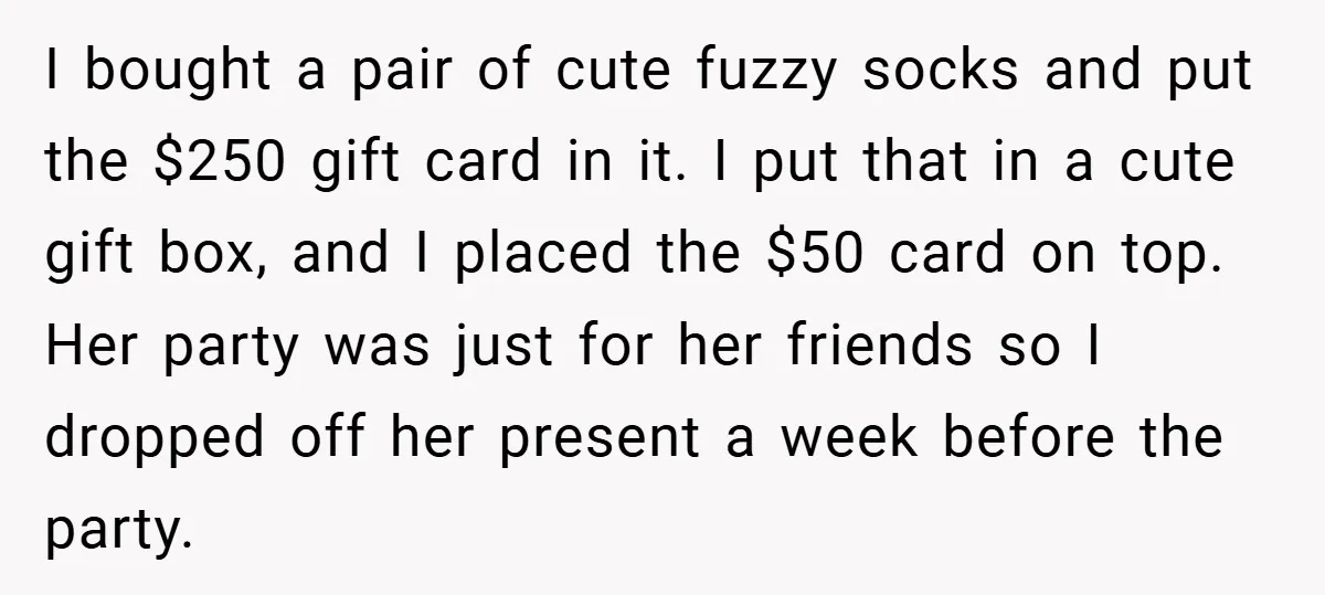 I bought a pair of cute fuzzy socks and put the $250 gift card in it. I put that in a cute gift box, and I placed the $50 card...