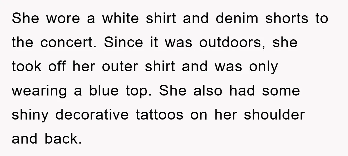 She wore a white shirt and denim shorts to the concert. Since it was outdoors, she took off her outer shirt and was only wearing a blue top. She also...