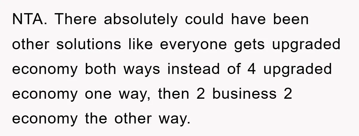 NTA. There absolutely could have been other solutions like everyone gets upgraded economy both ways instead of 4 upgraded economy one way, then 2 business 2 economy the other way.