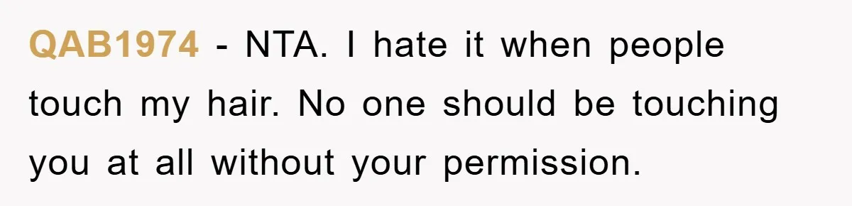 QAB1974 - NTA. I hate it when people touch my hair. No one should be touching you at all without your permission.