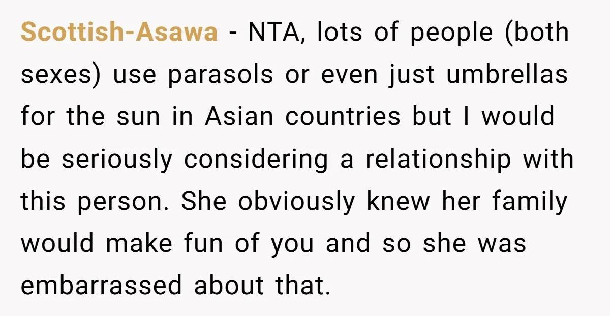 Scottish-Asawa − NTA, lots of people (both sexes) use parasols or even just umbrellas for the sun in Asian countries but I would be seriously considering a relationship with this...