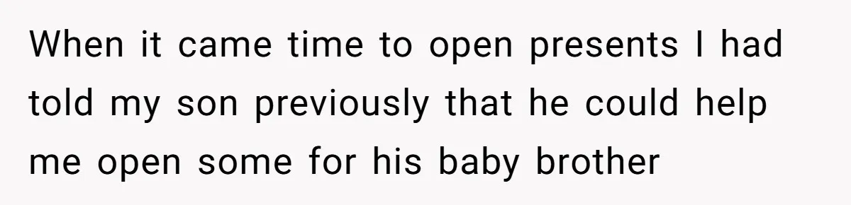 When it came time to open presents I had told my son previously that he could help me open some for his baby brother