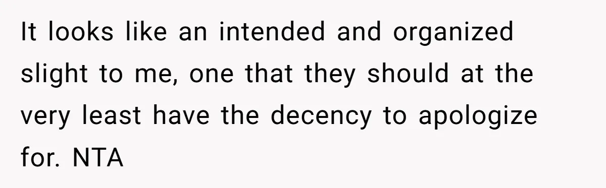 It looks like an intended and organized slight to me, one that they should at the very least have the decency to apologize for. NTA
