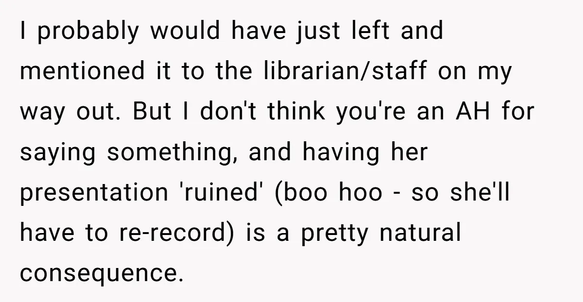 I probably would have just left and mentioned it to the librarian/staff on my way out. But I don't think you're an AH for saying something, and having her presentation...