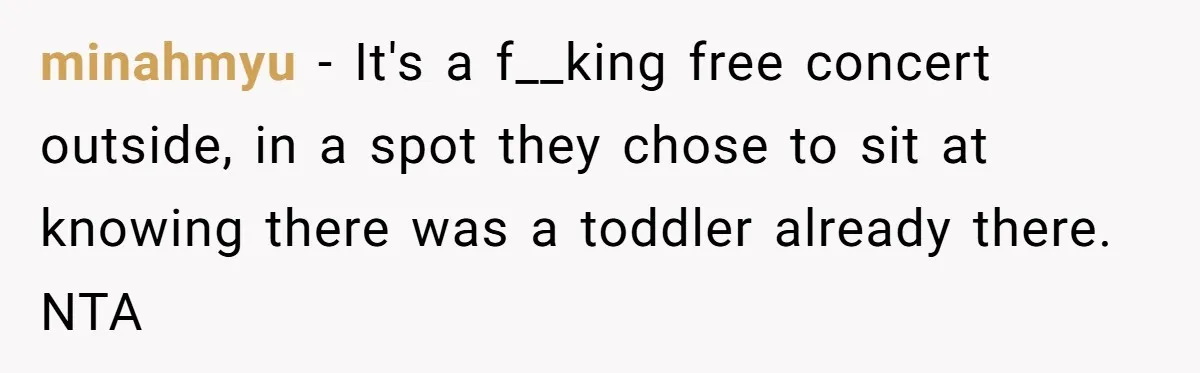 minahmyu − It's a f__king free concert outside, in a spot they chose to sit at knowing there was a toddler already there. NTA