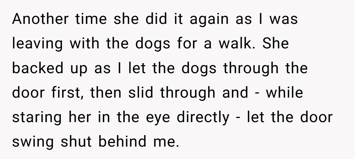 Another time she did it again as I was leaving with the dogs for a walk. She backed up as I let the dogs through the door first, then slid...
