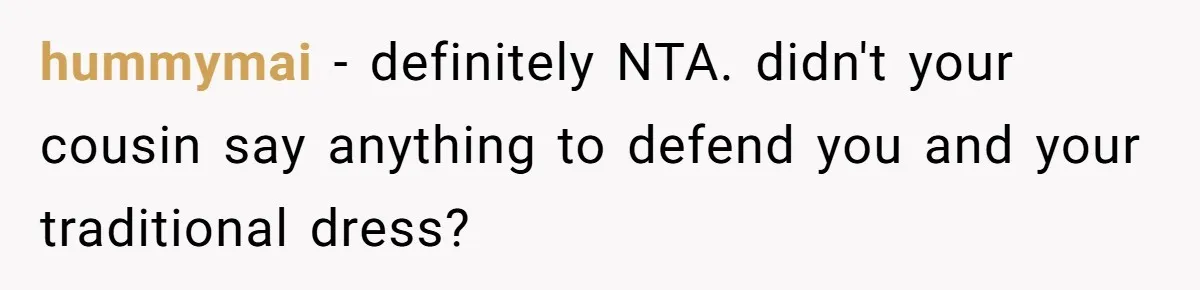 hummymai − definitely NTA. didn't your cousin say anything to defend you and your traditional dress?