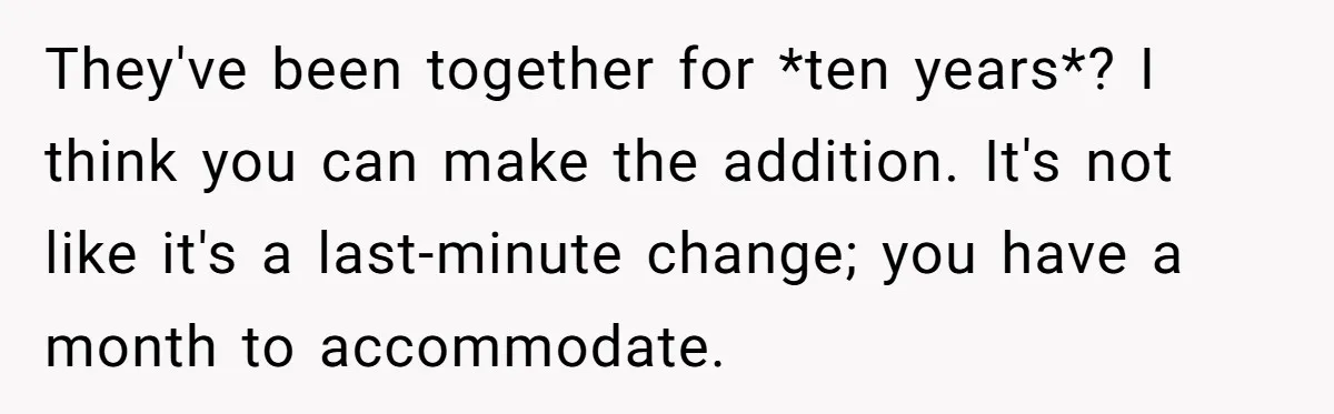 They've been together for *ten years*? I think you can make the addition. It's not like it's a last-minute change; you have a month to accommodate.