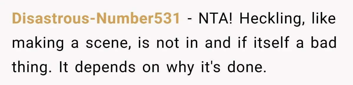 Disastrous-Number531 − NTA! Heckling, like making a scene, is not in and if itself a bad thing. It depends on why it's done.