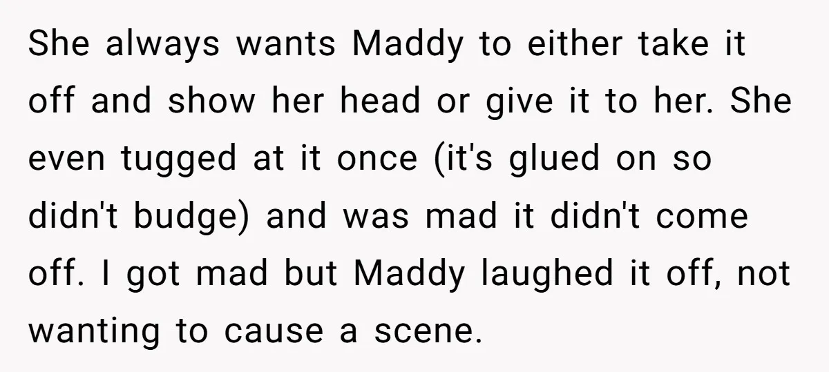 She always wants Maddy to either take it off and show her head or give it to her. She even tugged at it once (it's glued on so didn't budge)...