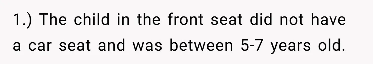 1.) The child in the front seat did not have a car seat and was between 5-7 years old.