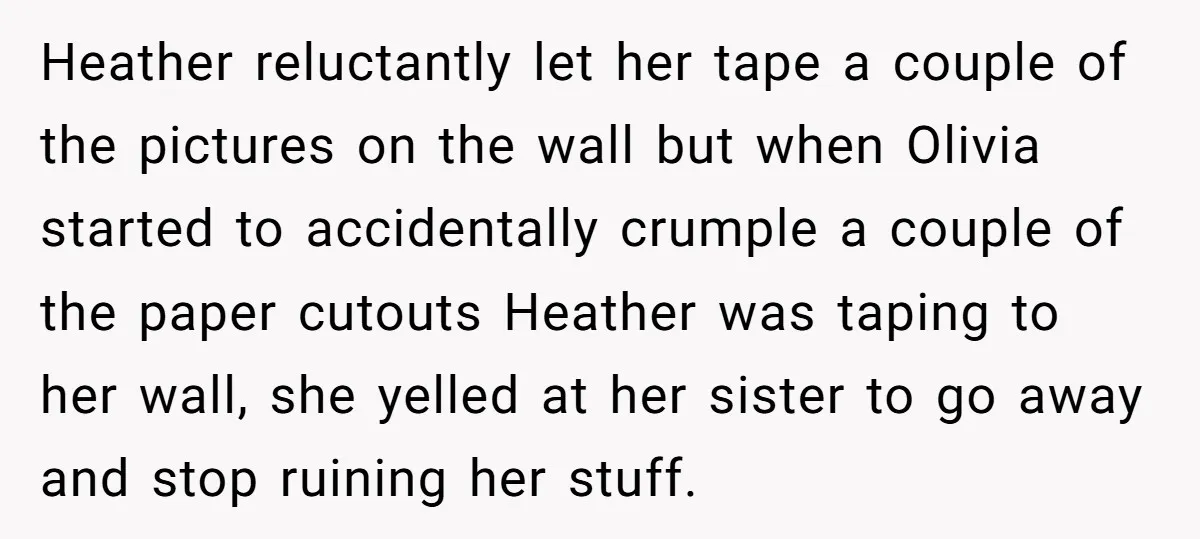 Heather reluctantly let her tape a couple of the pictures on the wall but when Olivia started to accidentally crumple a couple of the paper cutouts Heather was taping to...