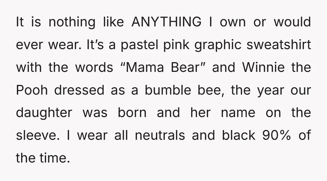 It is nothing like ANYTHING I own or would ever wear. It’s a pastel pink graphic sweatshirt with the words “Mama Bear” and Winnie the Pooh dressed as a bumble...