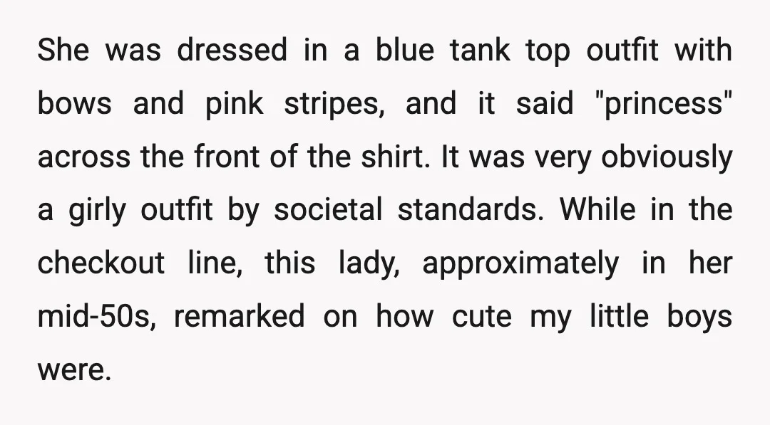She was dressed in a blue tank top outfit with bows and pink stripes, and it said "princess" across the front of the shirt. It was very obviously a girly...