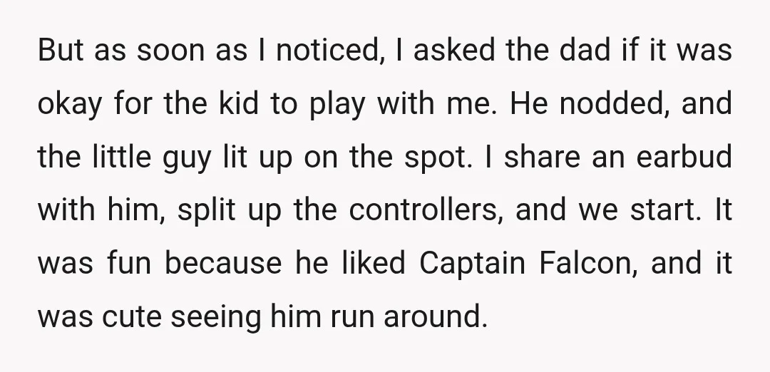 But as soon as I noticed, I asked the dad if it was okay for the kid to play with me. He nodded, and the little guy lit up on...