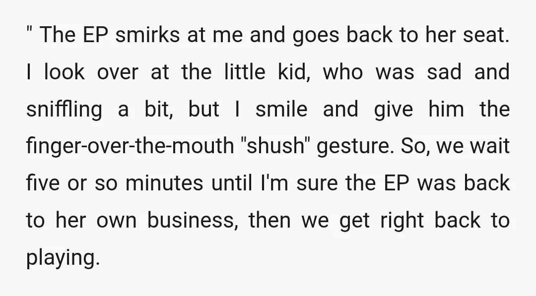 " The EP smirks at me and goes back to her seat. I look over at the little kid, who was sad and sniffling a bit, but I smile and...